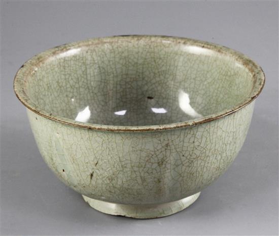 A celadon lobed bowl, possibly Korean, Goryeo dynasty (12th century), old gilt repairs to rim chips, diameter 15.5cm